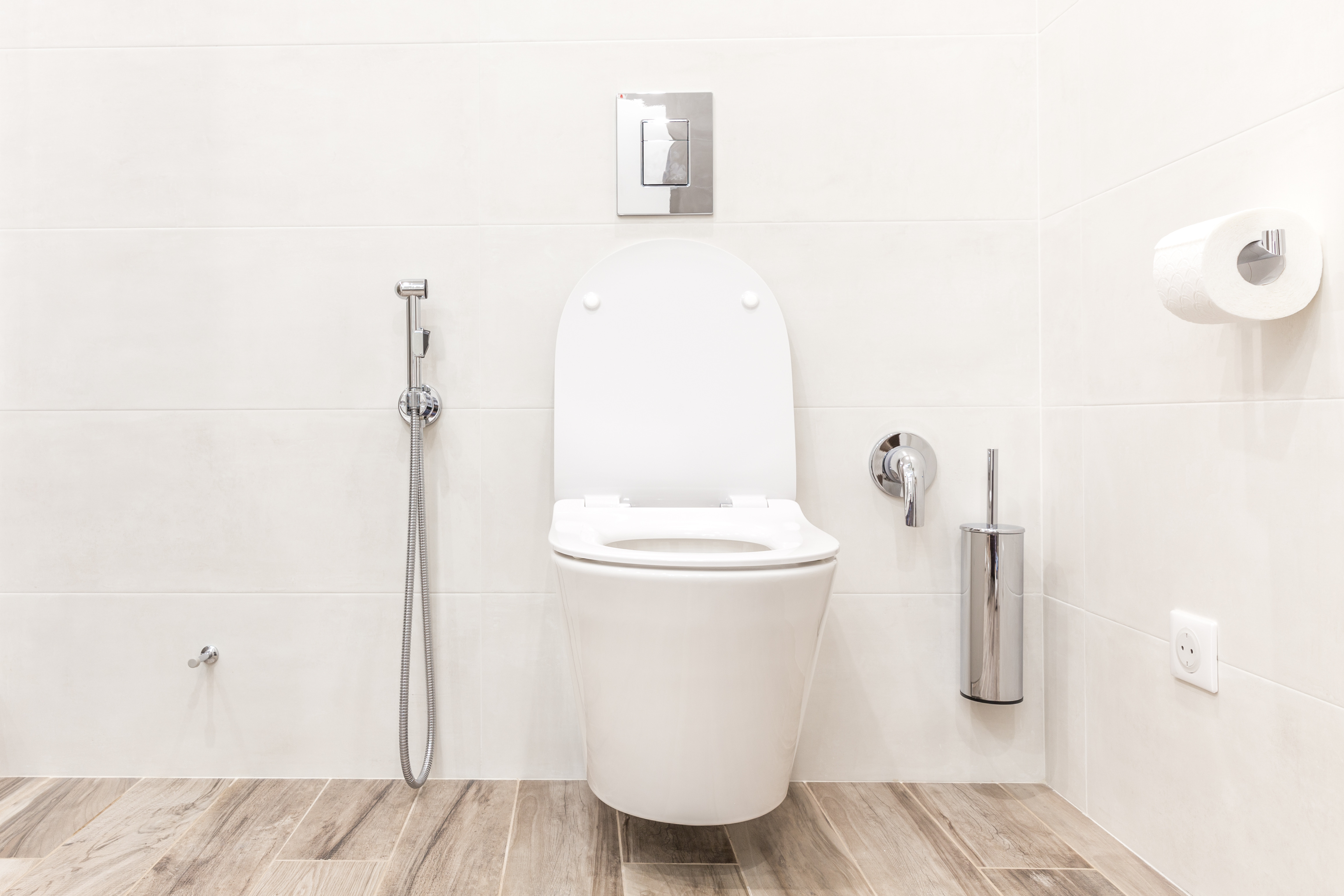 Wo soll man den Behälter für die WC-Bürste aufstellen?